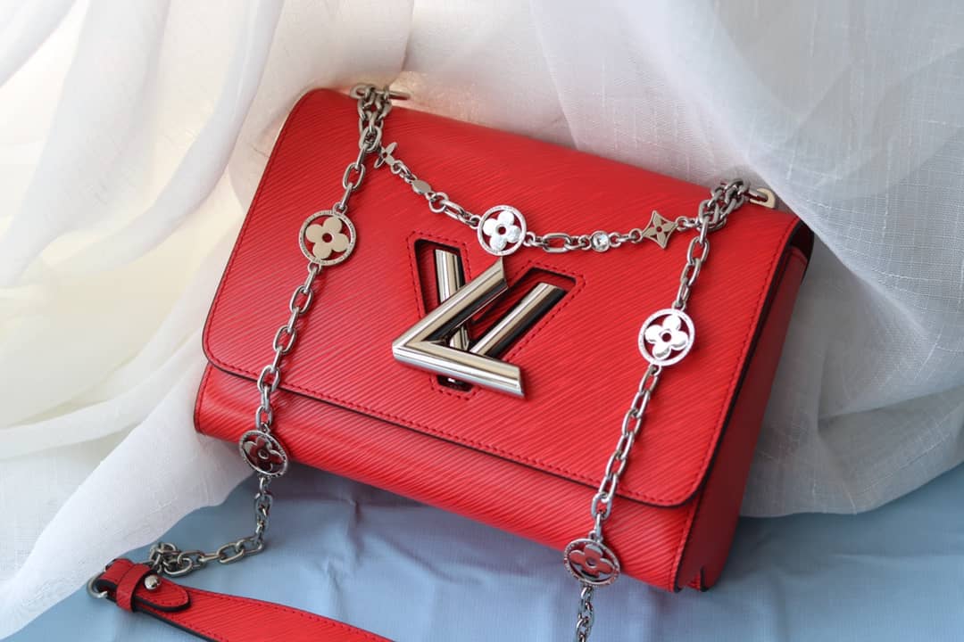 L0vis Vvtt0n Textured Epi Leather Twist Series Bag