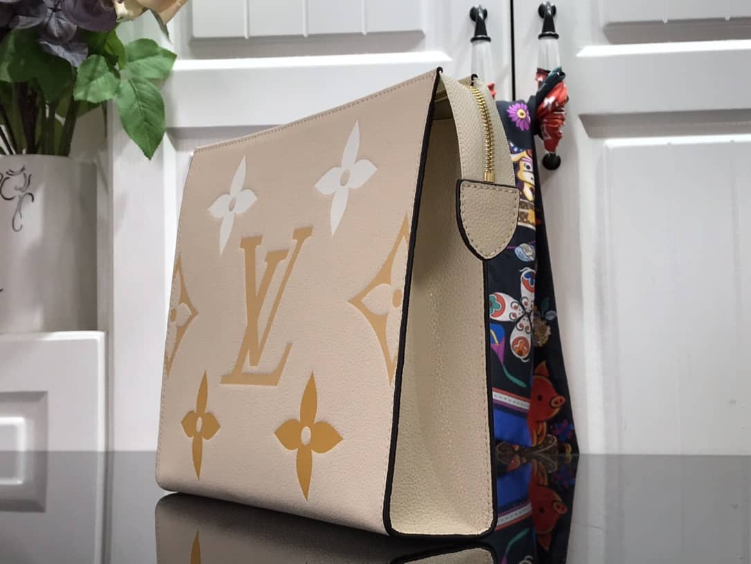 L0vis Vvtt0n Summer Toiletry Pouch Monogram Empreinte Replica Apricot M80504