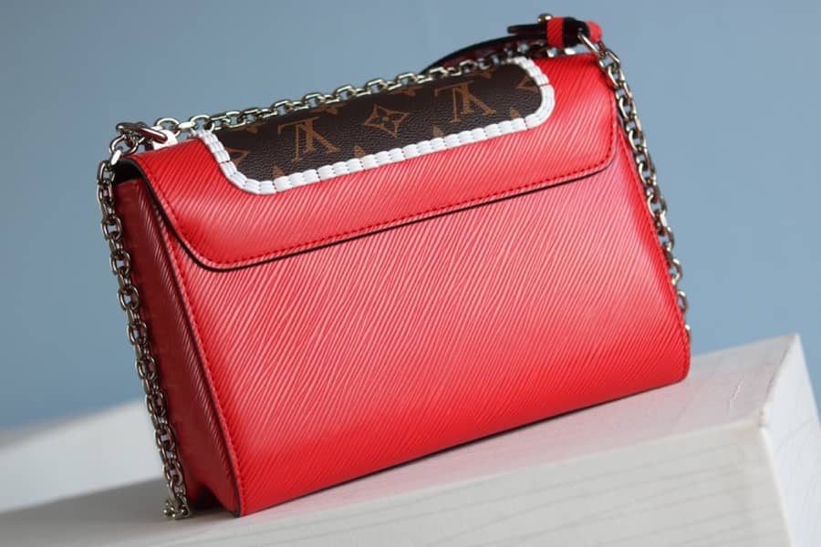 L0vis Vvtt0n Textured Epi Leather Twist Series Bag