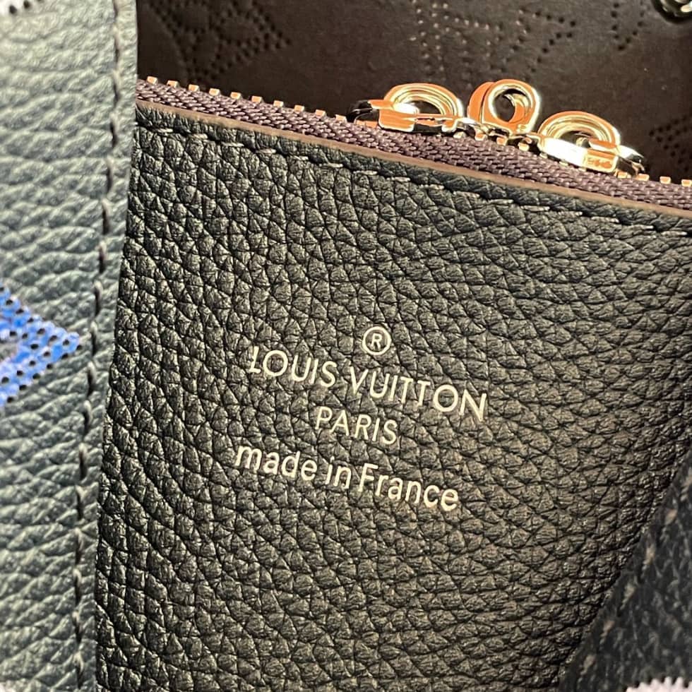 L0vis Vvtt0n Mahina Perforated Calfskin Muria Dark Blue M59554 Replica Bucket Bag