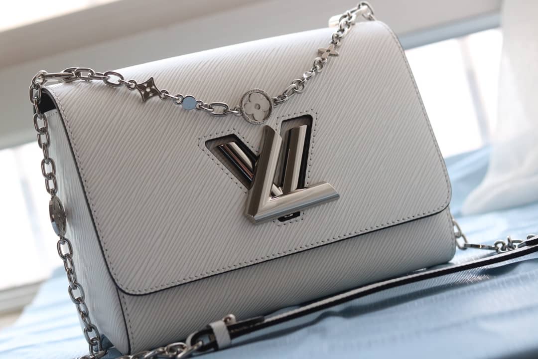 L0vis Vvtt0n Textured Epi Leather Twist Series Bag