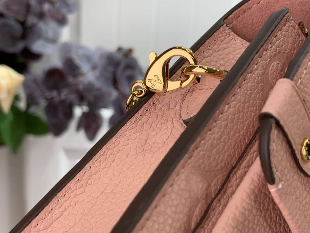 L0vis Vvtt0n Vavin Chain Empreinte Leather Replica Bag Pink M63398