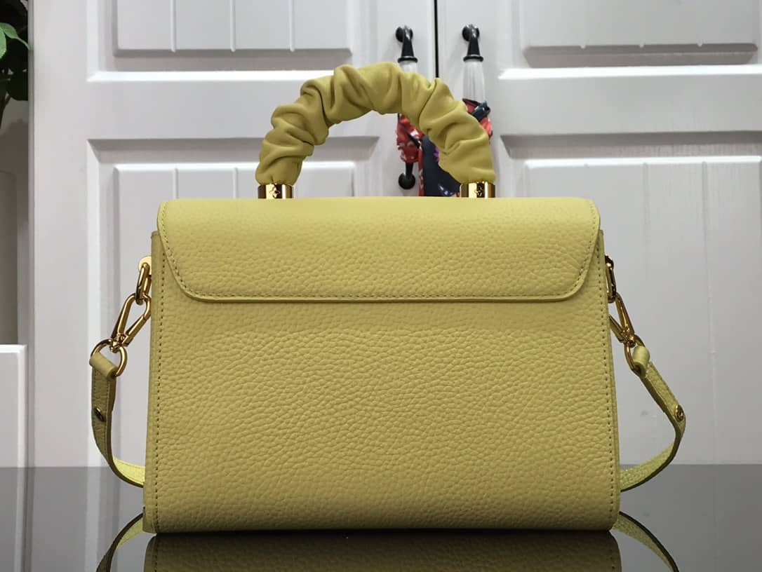 L0vis Vvtt0n Replica Bags Twist PM Pondichery Taurillon Leather Replica Bag Yellow M58691
