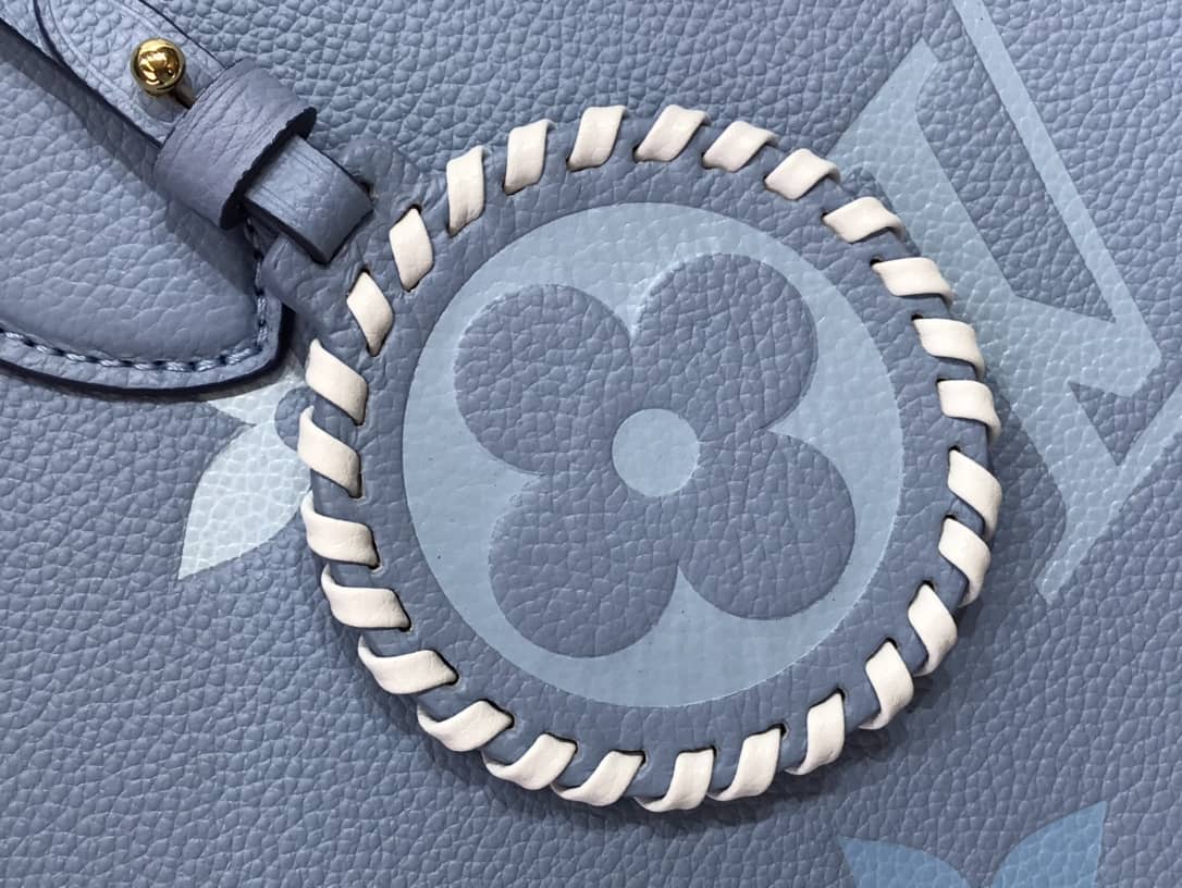 L0vis Vvtt0n On the Go MM Monogram Empreinte Two-way Tote Replica Blue M45717