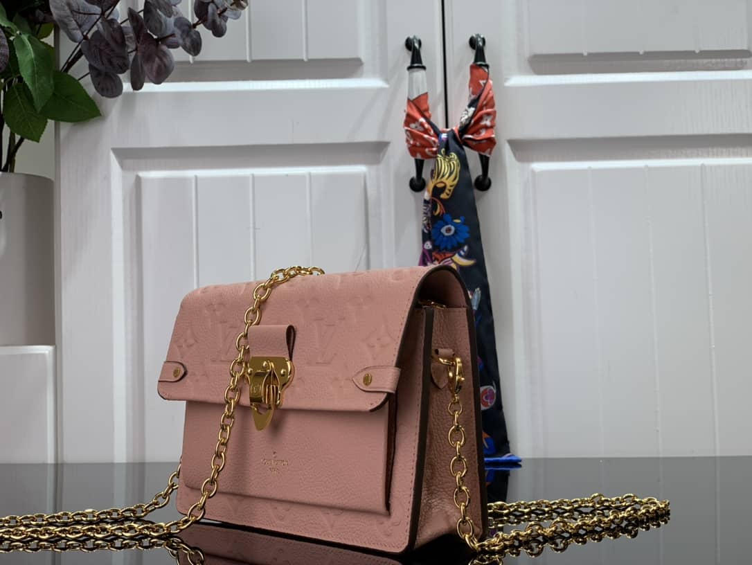 L0vis Vvtt0n Vavin Chain Empreinte Leather Replica Bag Pink M63398