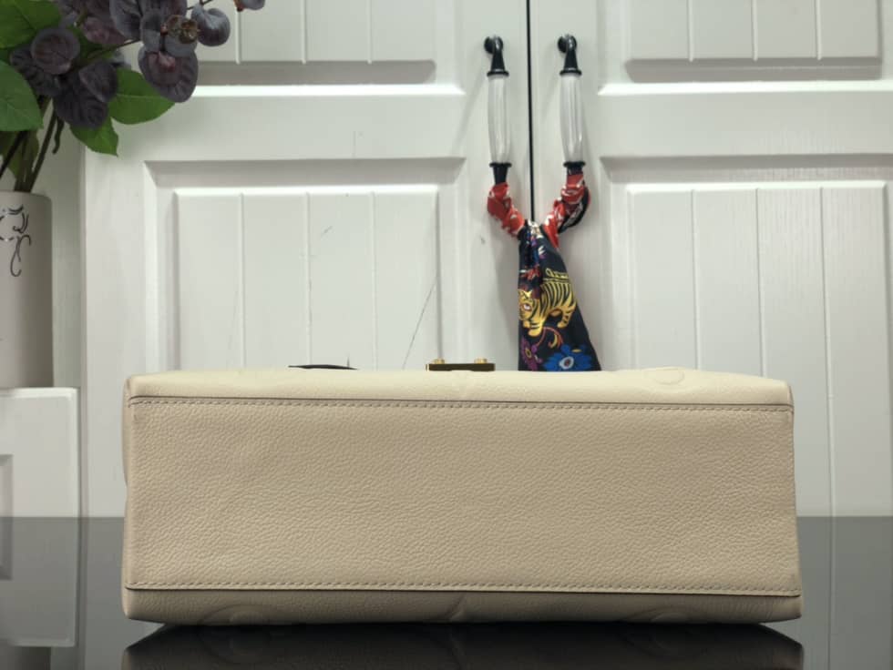 L0vis Vvtt0n Monogram Empreinte Madeleine MM M45976 Replica Shoulder Bag