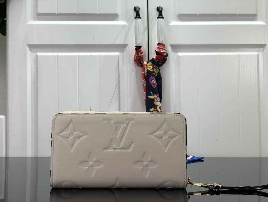 L0vis Vvtt0n Monogram Empreinte Leather with Animal-Print Zippy Wallet Replica White M80680