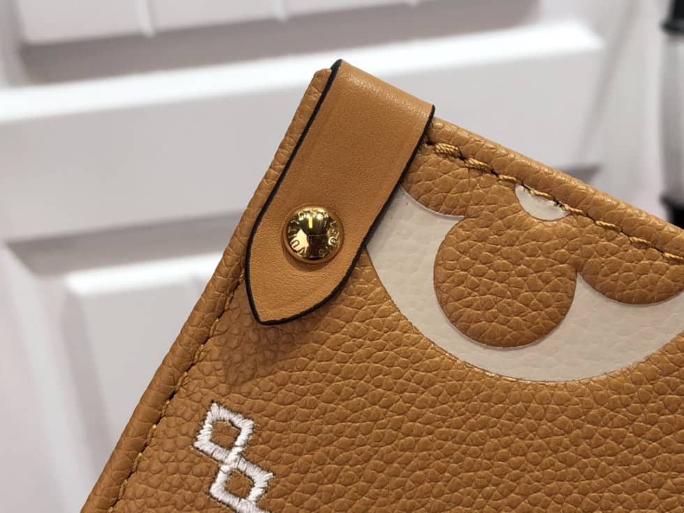 L0vis Vvtt0n Onthego MM Monogram Empreinte M46015 Replica Tote