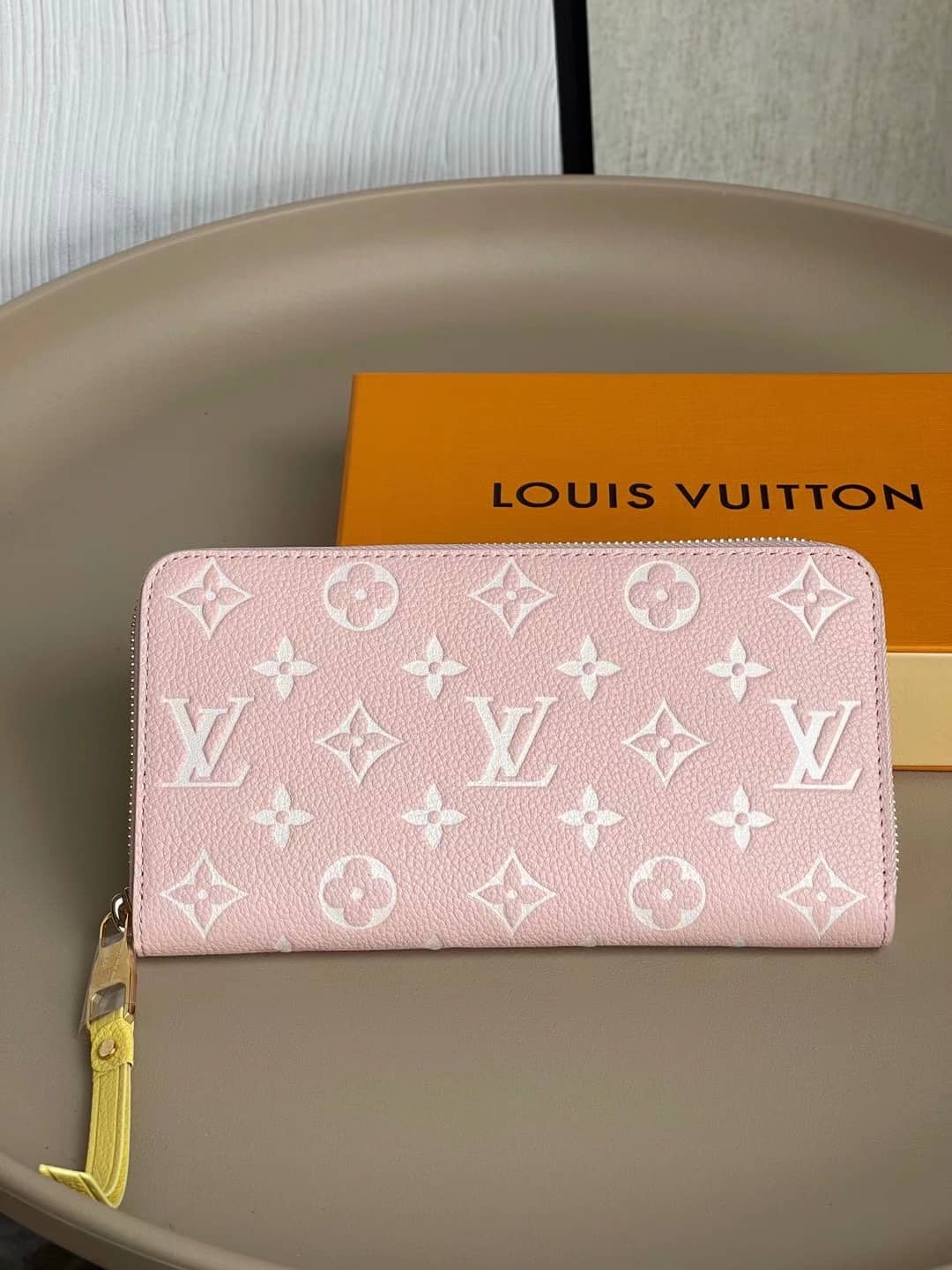 L0vis Vvtt0n Monogram Empreinte Leather Zippy Pink M81279 Replica Wallet
