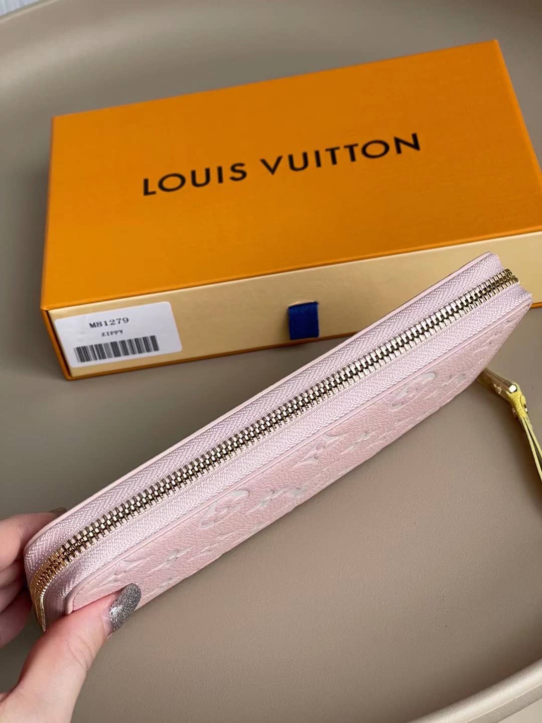 L0vis Vvtt0n Monogram Empreinte Leather Zippy Pink M81279 Replica Wallet