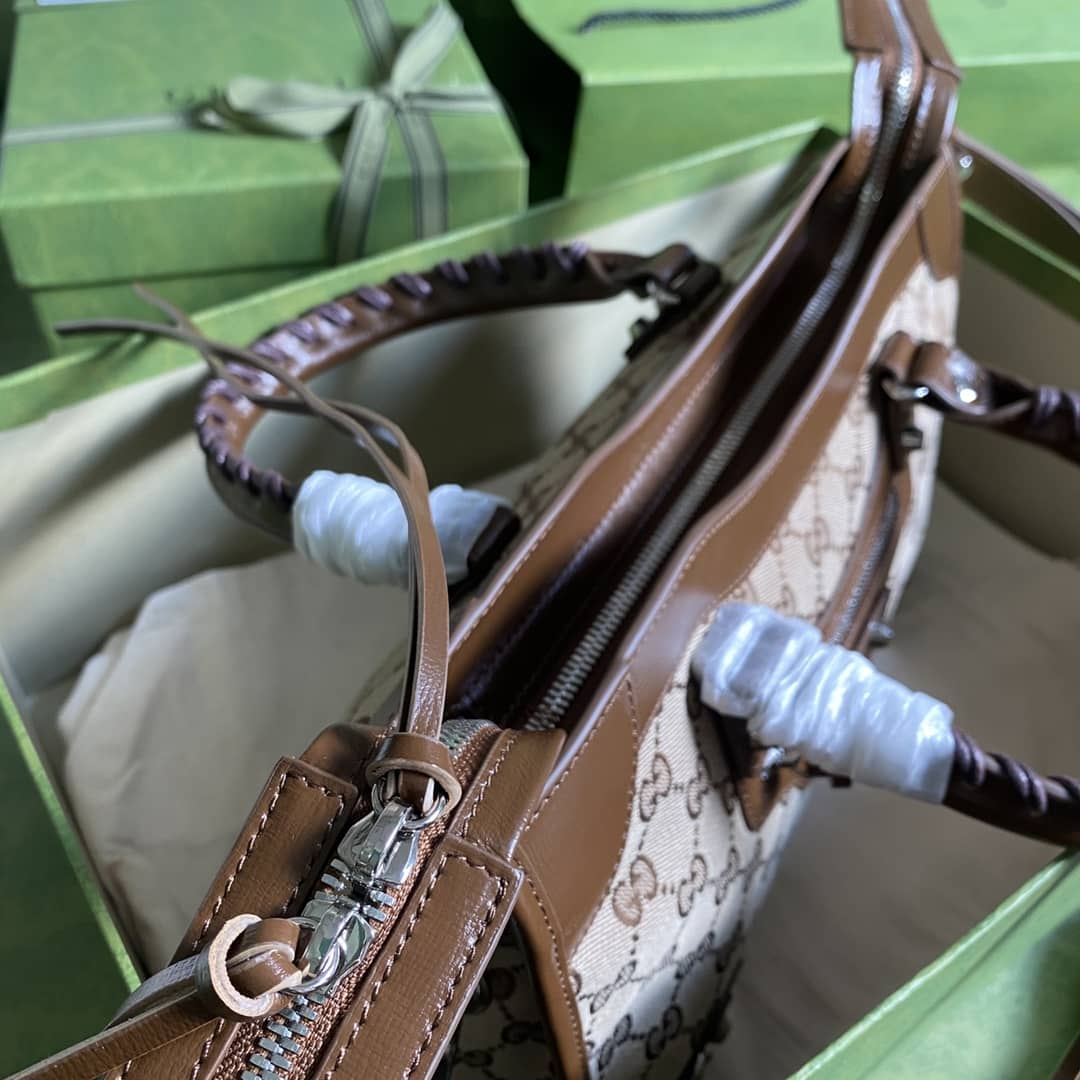 Gvc*1 x Ba1en*iaga GG Canvas City Bag Replica 658597