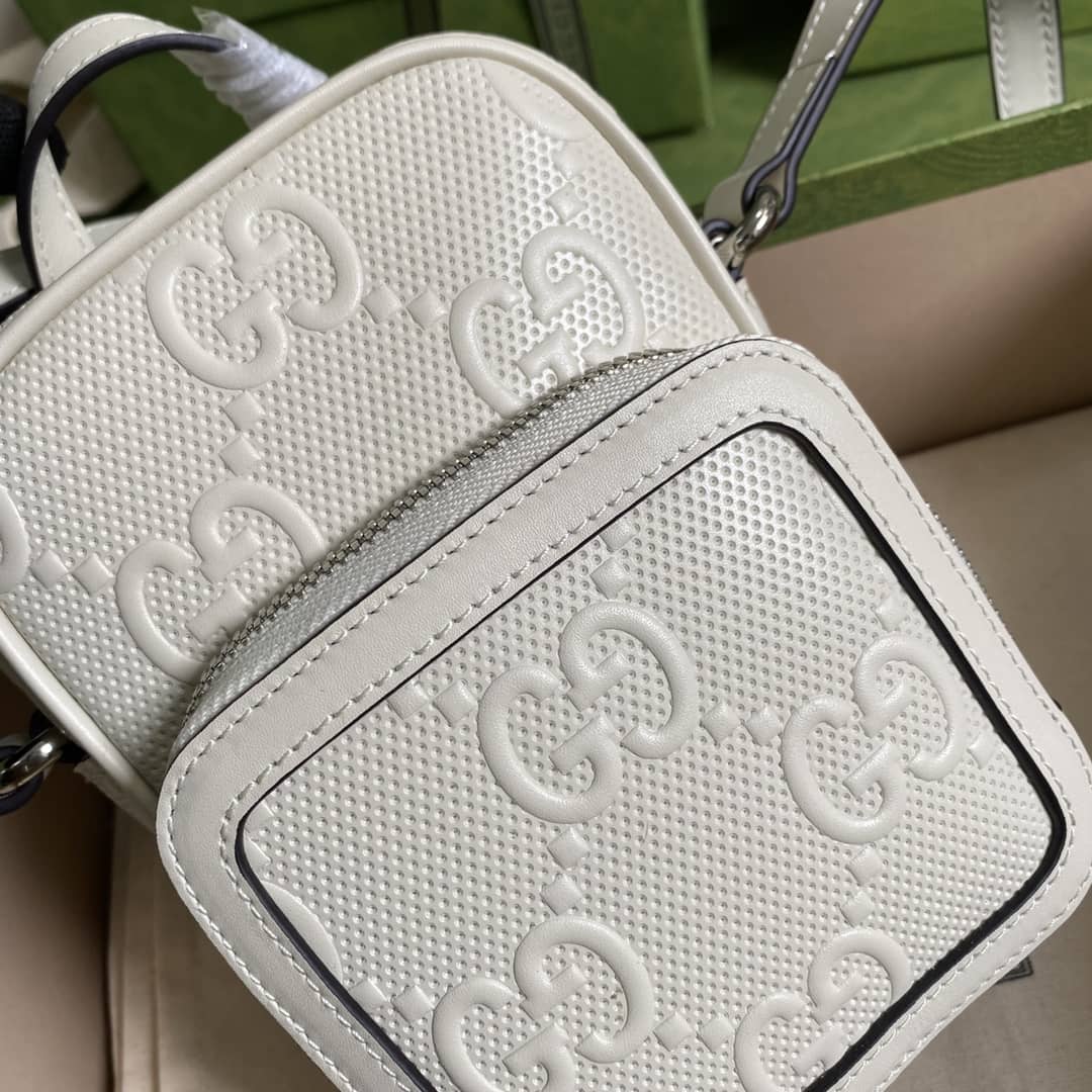 Gvc*1 GG Embossed Mini Bag Replica 658553