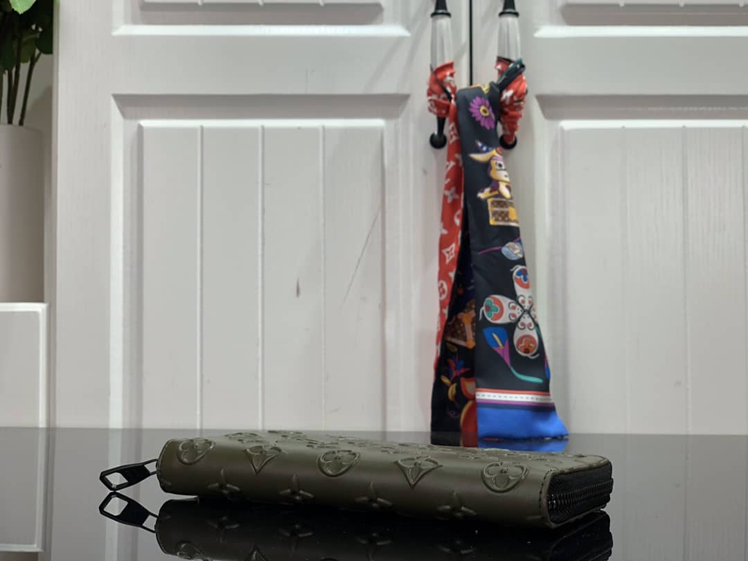 L0vis Vvtt0n Wallet Dupe Zippy Veltical Monogram Seal M80505