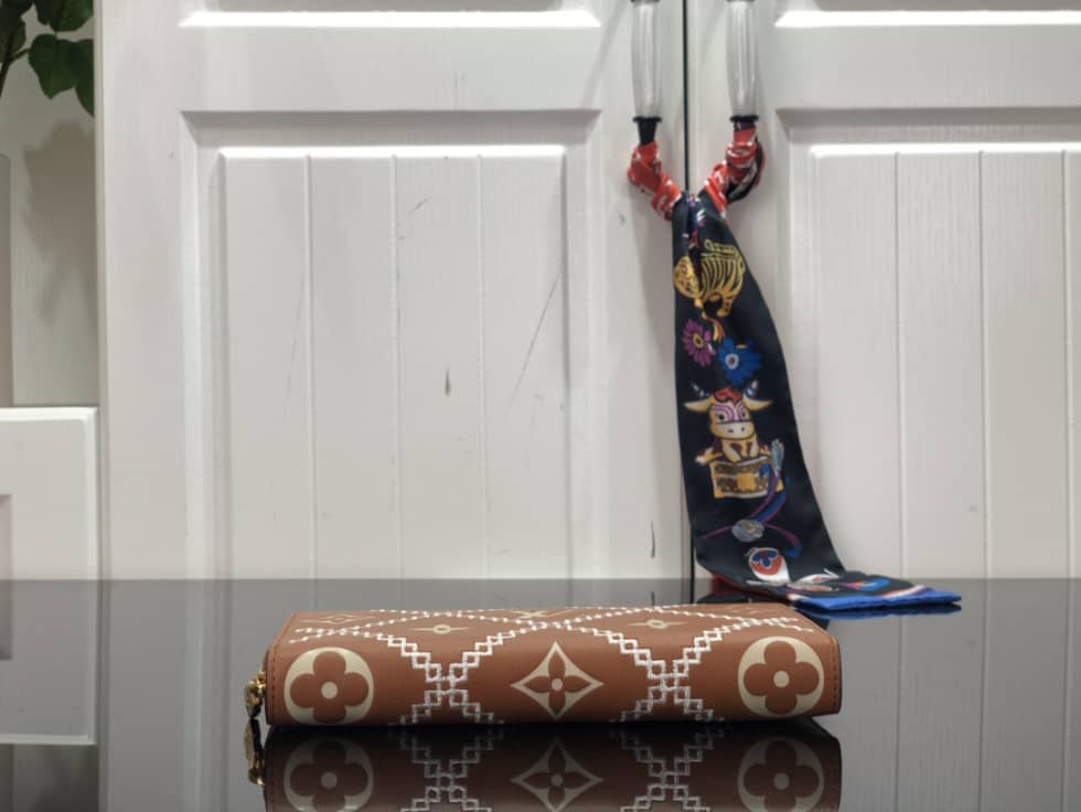 L0vis Vvtt0n Wallet Dupe Zippy Monogram Empreinte Leather Brown M81141