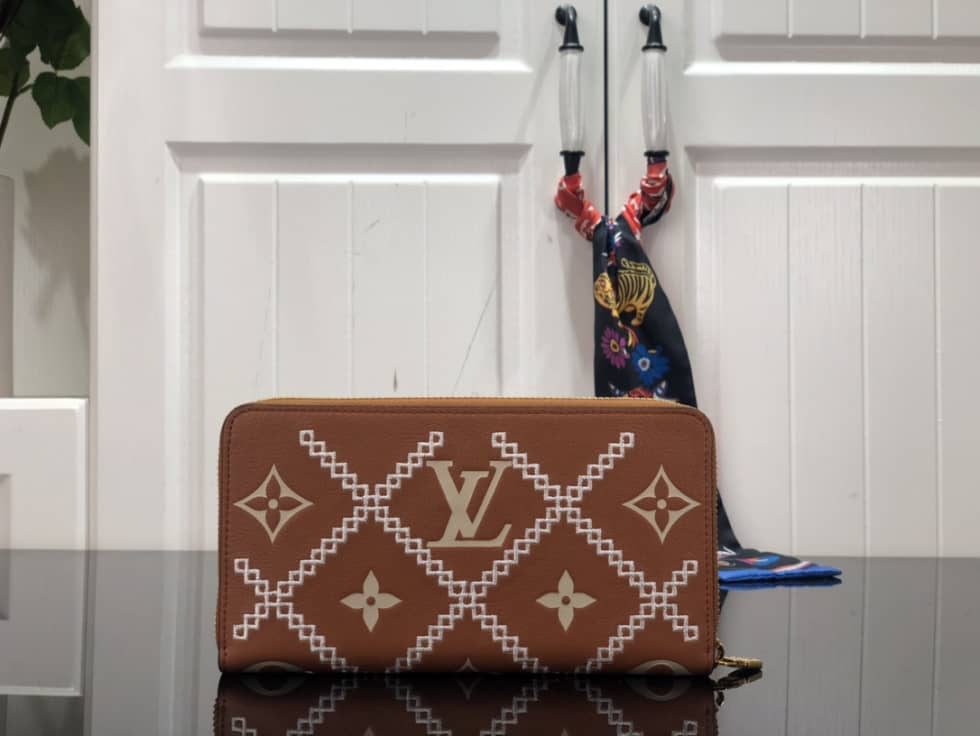 L0vis Vvtt0n Wallet Dupe Zippy Monogram Empreinte Leather Brown M81141