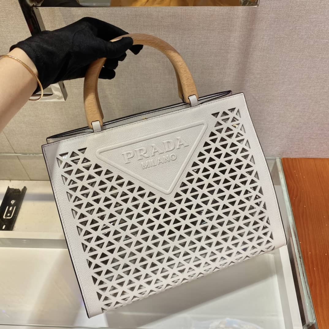 Pra*a Hollow Out Cowhide Leather Beech Tote