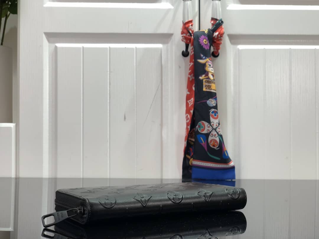 L0vis Vvtt0n Wallet Dupe Zippy Veltical Monogram SealM80505